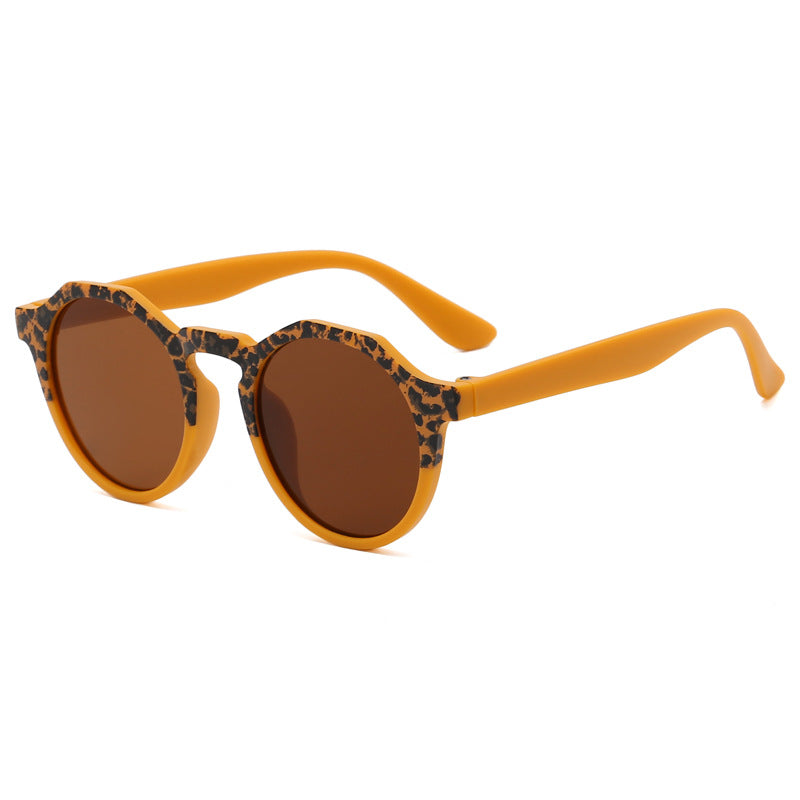 Venta al por mayor de gafas de sol para niños con protección solar y marco redondo para PC